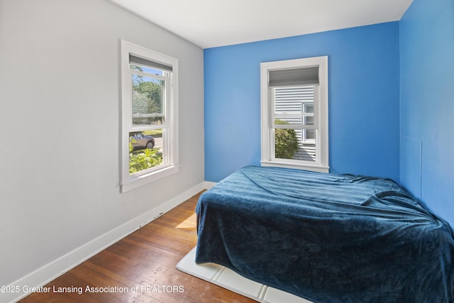 2335 Harding Ave, Lansing, MI 48910 - bedroom with wood finished floors and baseboards