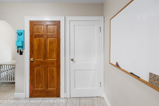 2335 Harding Ave, Lansing, MI 48910 - doorway with light tile patterned floors and arched walkways
