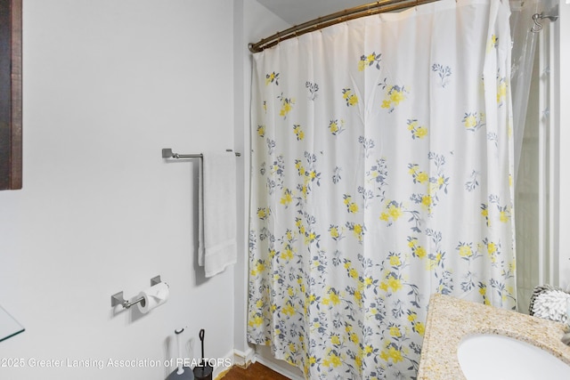 2335 Harding Ave, Lansing, MI 48910 - bathroom featuring vanity and a shower with curtain