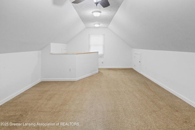 2335 Harding Ave, Lansing, MI 48910 - bonus room with carpet floors, a ceiling fan, and vaulted ceiling
