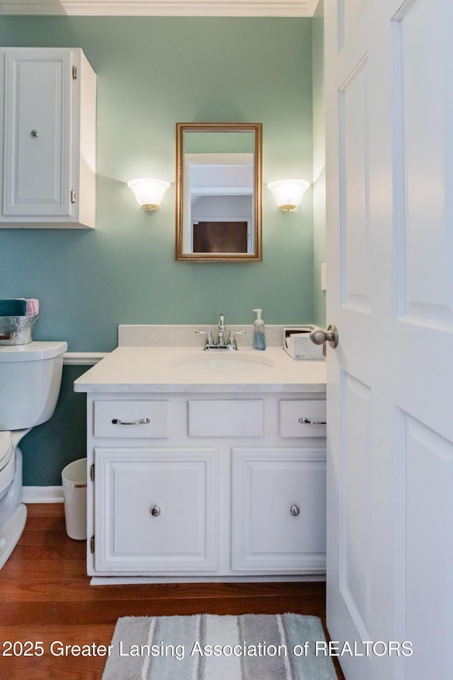 5939 Highgate Ave, East Lansing, MI 48823 - bathroom with vanity and wood finished floors