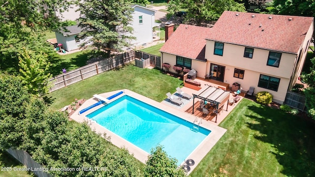5939 Highgate Ave, East Lansing, MI 48823 - view of swimming pool featuring a fenced backyard and a patio