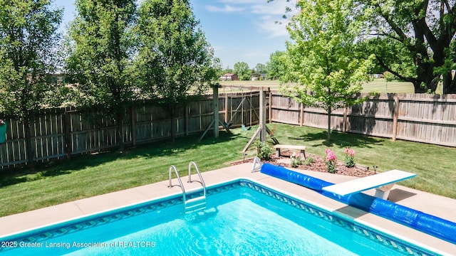 5939 Highgate Ave, East Lansing, MI 48823 - view of swimming pool with a fenced backyard
