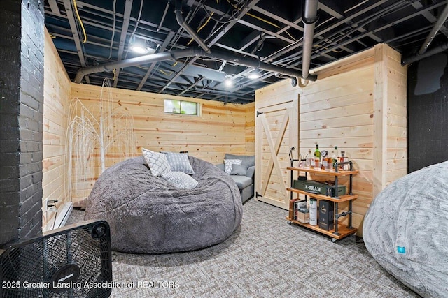 3707 W Michigan Ave, Lansing, MI 48917 - carpeted bedroom with wood walls