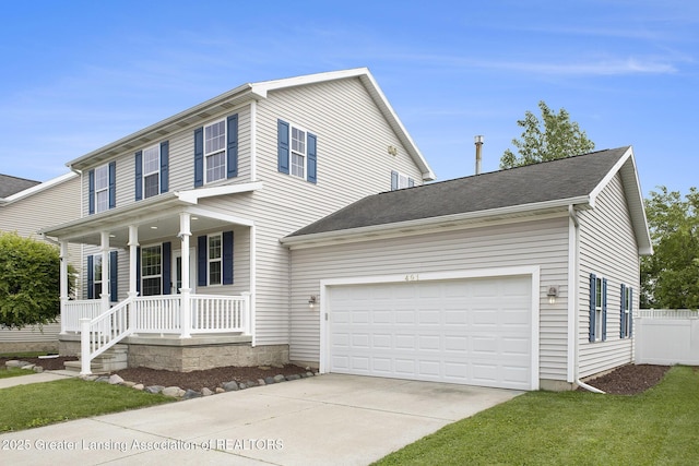 491 Anhinga Dr, East Lansing, MI 48823 - view of front of house featuring covered porch and concrete driveway