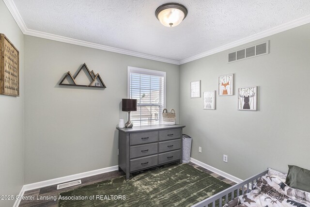 491 Anhinga Dr, East Lansing, MI 48823 - bedroom featuring ornamental molding and a textured ceiling