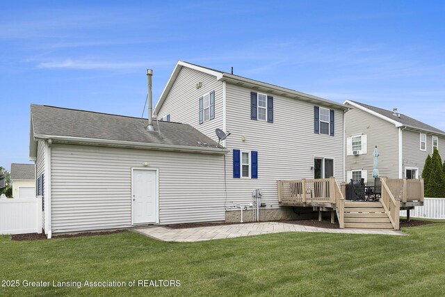 491 Anhinga Dr, East Lansing, MI 48823 - back of property with a wooden deck and a patio area