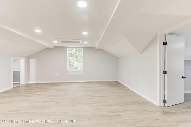 1041 Parker St, Lansing, MI 48912 - bonus room featuring light wood finished floors, recessed lighting, and lofted ceiling