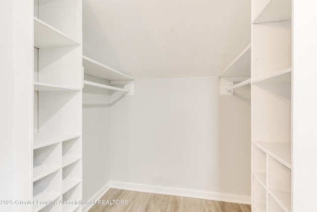 1041 Parker St, Lansing, MI 48912 - spacious closet with wood finished floors