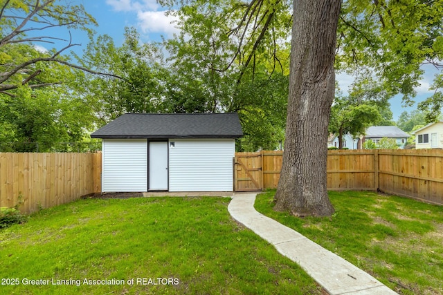 1041 Parker St, Lansing, MI 48912 - fenced backyard with an outbuilding