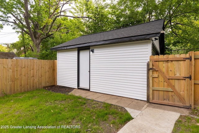 1041 Parker St, Lansing, MI 48912 - view of outbuilding featuring a gate