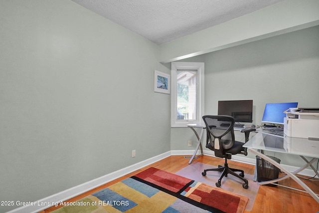 1603 Roseland Ave, East Lansing, MI 48823 - office space with wood finished floors and a textured ceiling