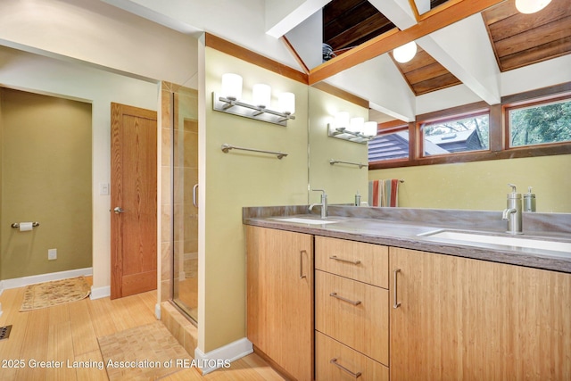 1603 Roseland Ave, East Lansing, MI 48823 - full bath featuring double vanity, a shower stall, wood finished floors, and wooden ceiling