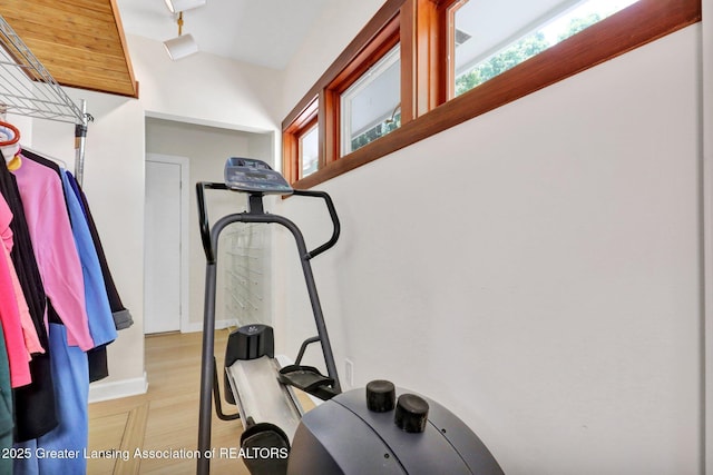 1603 Roseland Ave, East Lansing, MI 48823 - workout area with lofted ceiling and light wood finished floors