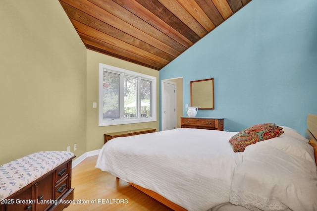 1603 Roseland Ave, East Lansing, MI 48823 - bedroom with lofted ceiling, wood ceiling, and light wood-style floors