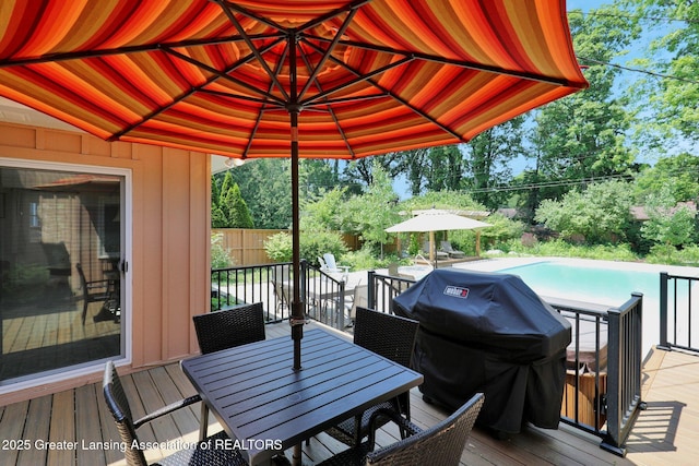1603 Roseland Ave, East Lansing, MI 48823 - deck with a grill and outdoor dining area