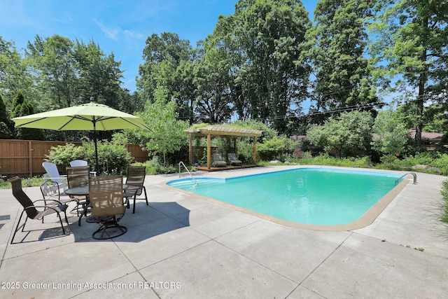 1603 Roseland Ave, East Lansing, MI 48823 - view of pool featuring a patio area, a pergola, and outdoor dining space