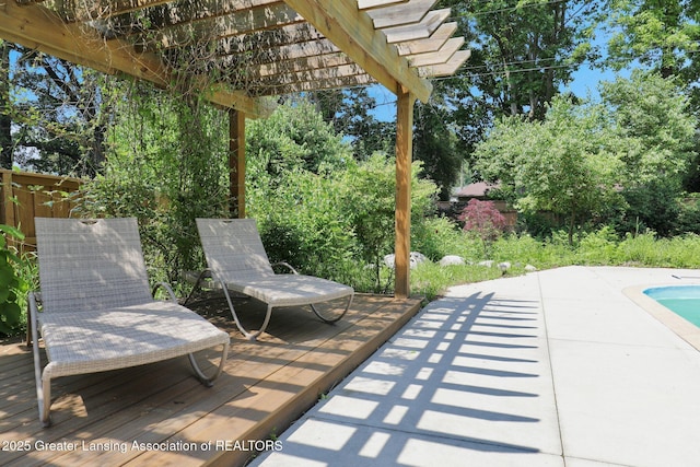 1603 Roseland Ave, East Lansing, MI 48823 - view of patio with an outdoor pool and a pergola
