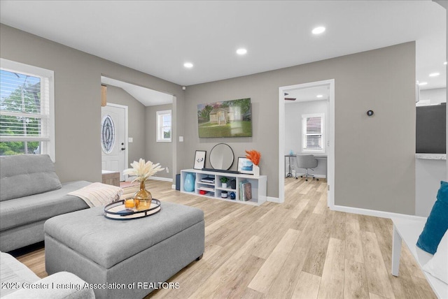 2914 W Holmes Rd, Lansing, MI 48911 - living room featuring healthy amount of natural light, light wood-type flooring, and recessed lighting