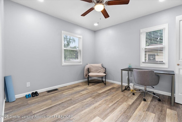 2914 W Holmes Rd, Lansing, MI 48911 - office space featuring ceiling fan, wood finished floors, and recessed lighting