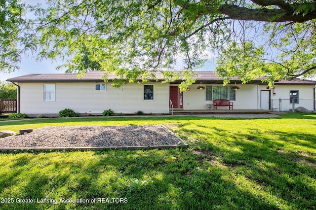 1234 Lamb Rd, Mason, MI 48854 - rear view of property featuring a porch