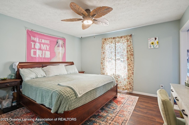 1234 Lamb Rd, Mason, MI 48854 - bedroom featuring dark wood-style floors, a textured ceiling, and a ceiling fan