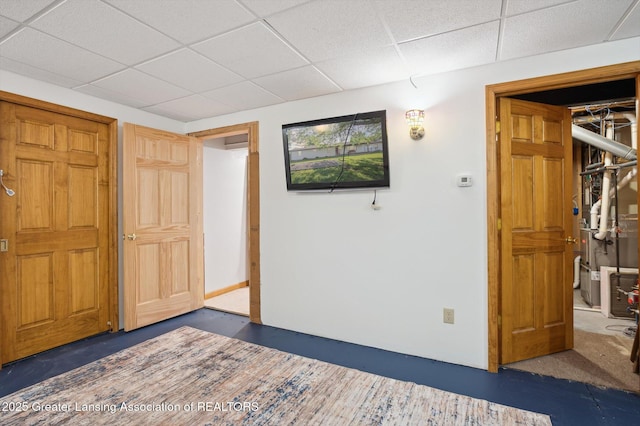 1234 Lamb Rd, Mason, MI 48854 - unfurnished bedroom featuring a drop ceiling