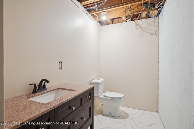 1234 Lamb Rd, Mason, MI 48854 - bathroom featuring vanity and marble look tiles