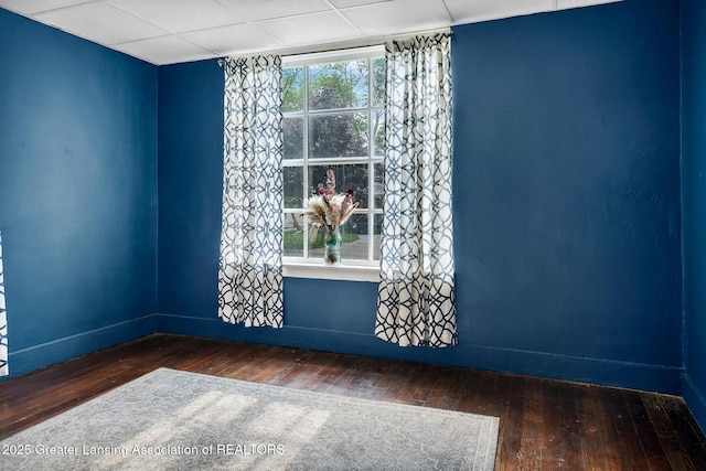 229 Rockingham Ave, Alma, MI 48801 - unfurnished room with hardwood / wood-style floors and baseboards