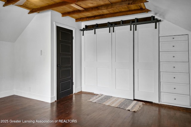 229 Rockingham Ave, Alma, MI 48801 - bonus room with dark wood-style flooring, wood ceiling, and a barn door