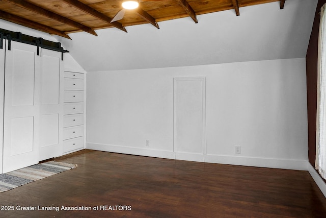 229 Rockingham Ave, Alma, MI 48801 - bonus room featuring a barn door, dark wood-style flooring, and wooden ceiling