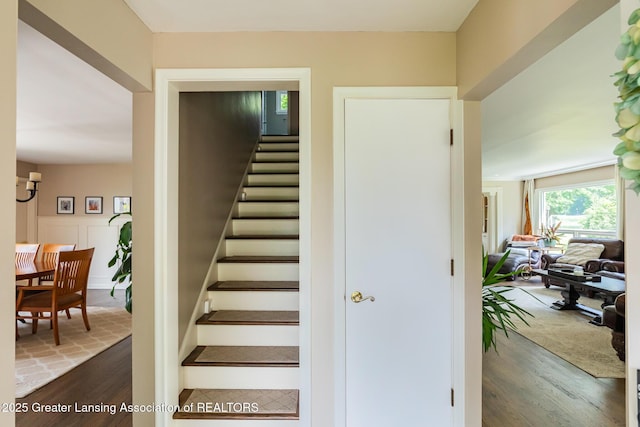 1717 Nottingham Rd, Lansing, MI 48911 - stairway featuring wood finished floors