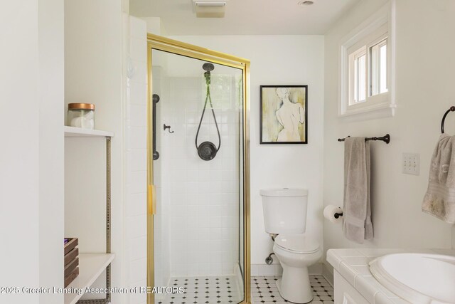 1717 Nottingham Rd, Lansing, MI 48911 - full bathroom featuring a stall shower, vanity, and tile patterned flooring