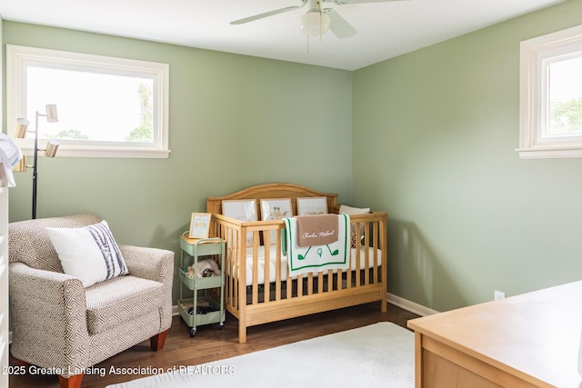 1717 Nottingham Rd, Lansing, MI 48911 - bedroom with wood finished floors and ceiling fan