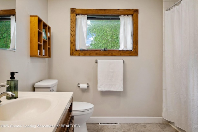 301 E Emerson St, Ithaca, MI 48847 - bathroom with vanity and a shower with shower curtain