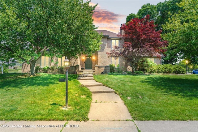 3886 Hemmingway Dr, Okemos, MI 48864 - obstructed view of property with a front yard