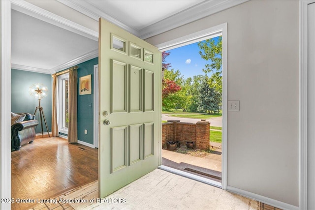 3886 Hemmingway Dr, Okemos, MI 48864 - entrance foyer with crown molding, healthy amount of natural light, and wood finished floors