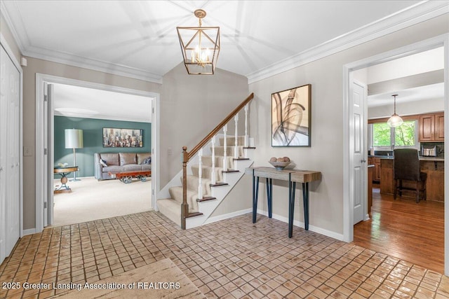 3886 Hemmingway Dr, Okemos, MI 48864 - entryway with stairway, a chandelier, and crown molding