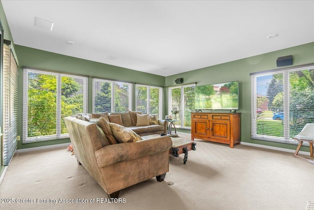 3886 Hemmingway Dr, Okemos, MI 48864 - sunroom featuring carpet and healthy amount of natural light