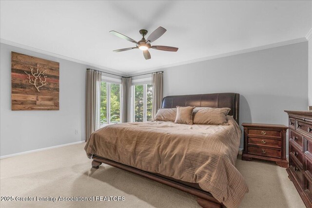3886 Hemmingway Dr, Okemos, MI 48864 - carpeted bedroom featuring crown molding and a ceiling fan