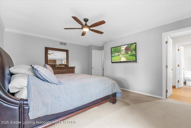 3886 Hemmingway Dr, Okemos, MI 48864 - bedroom with carpet flooring, ornamental molding, ceiling fan, and connected bathroom