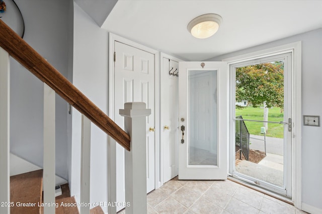 15754 Culver Dr, East Lansing, MI 48823 - entrance foyer featuring light tile patterned floors
