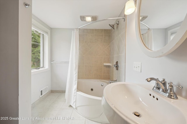 15754 Culver Dr, East Lansing, MI 48823 - full bath with shower / bathtub combination with curtain and tile patterned flooring