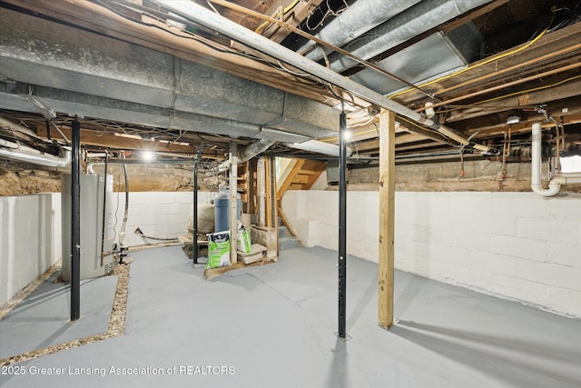 15754 Culver Dr, East Lansing, MI 48823 - unfinished below grade area featuring stairs