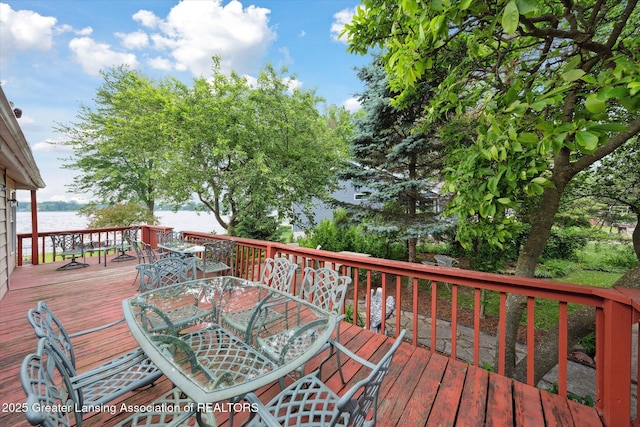 15754 Culver Dr, East Lansing, MI 48823 - deck with outdoor dining area and a water view