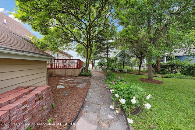 15754 Culver Dr, East Lansing, MI 48823 - view of grassy yard featuring a wooden deck