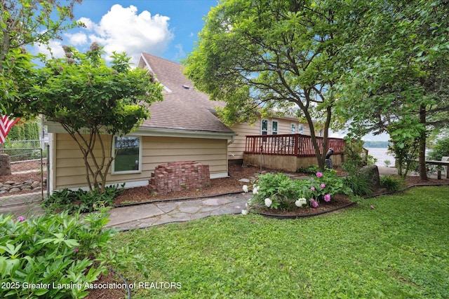 15754 Culver Dr, East Lansing, MI 48823 - view of yard featuring a deck