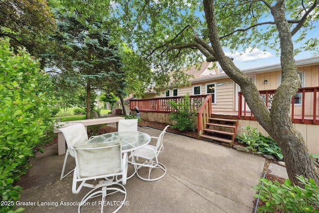 15754 Culver Dr, East Lansing, MI 48823 - view of patio featuring outdoor dining space and a deck