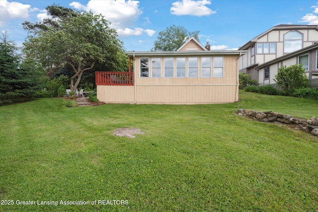 15754 Culver Dr, East Lansing, MI 48823 - back of property with a lawn