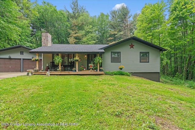 11100 S Bird Rd, Dowling, MI 49050 - view of front facade with a chimney, a front lawn, a garage, covered porch, and driveway
